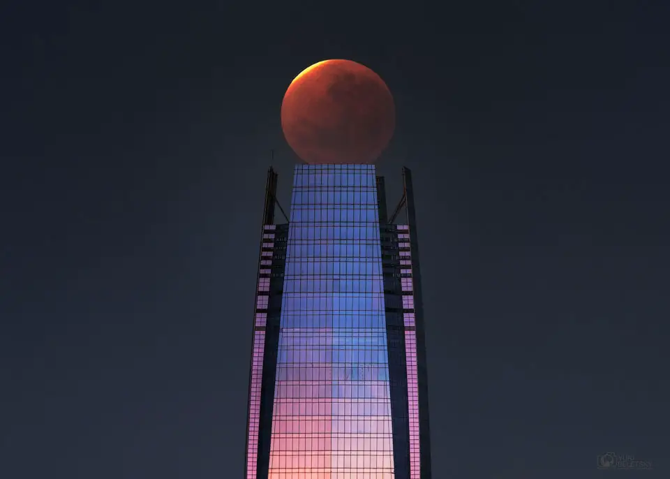 Lunar Eclipse over a Skyscraper